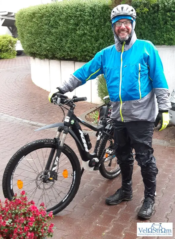 alex-biking-in-the-rain