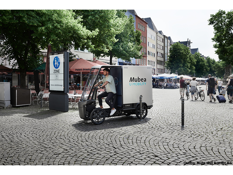 Mubea U Mobility Cargobike in einer Fußgängerzone.