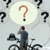 e-bike-und-mensch-mit-vielen-fragezeichen